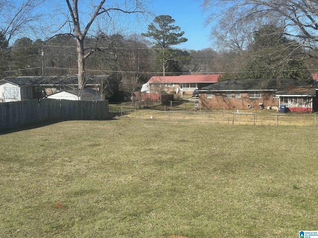 view of yard with fence