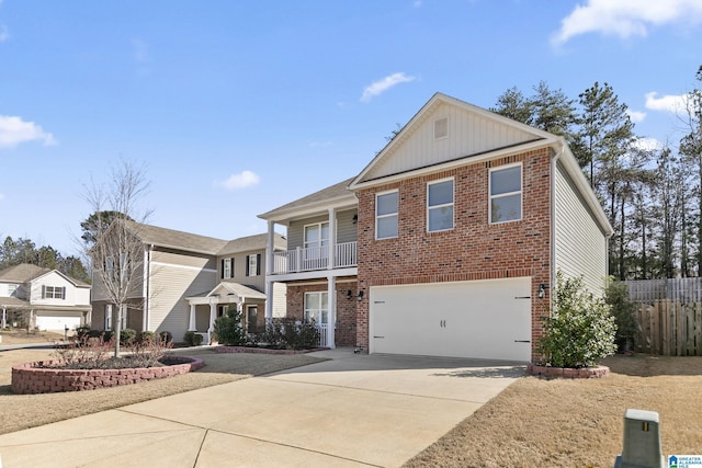 traditional home with driveway, an attached garage, board and batten siding, and brick siding