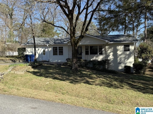 single story home with a front lawn and crawl space