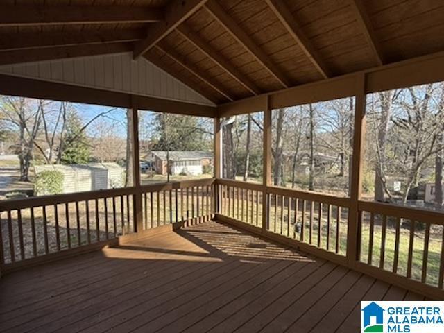 deck featuring a storage shed