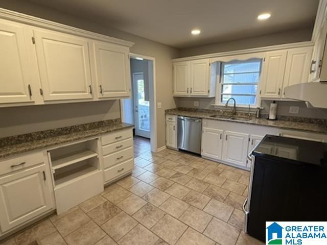 kitchen featuring dishwasher, dark stone countertops, white cabinetry, a sink, and recessed lighting