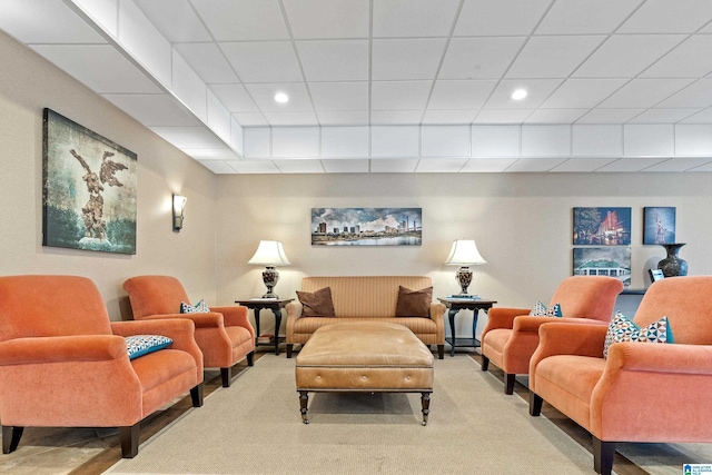 interior space featuring recessed lighting, carpet flooring, and a drop ceiling