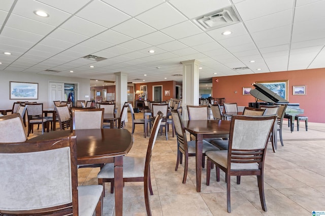 dining area with ornate columns, light tile patterned floors, visible vents, and recessed lighting