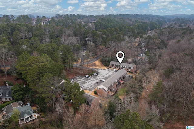 drone / aerial view with a view of trees