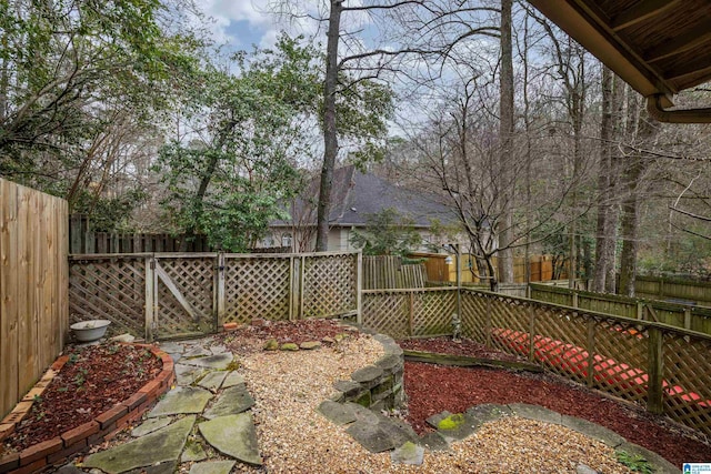 view of yard featuring a fenced backyard