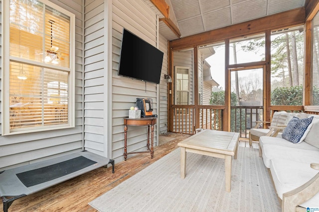 sunroom / solarium with beamed ceiling and a wealth of natural light