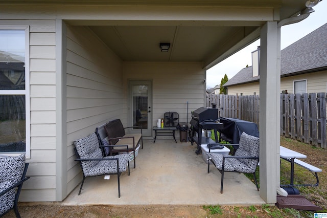 view of patio with fence