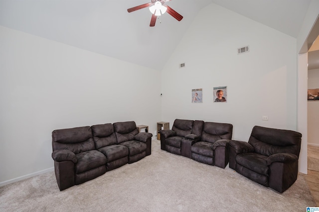 living room featuring high vaulted ceiling, light colored carpet, ceiling fan, and visible vents