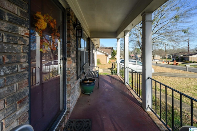 balcony featuring a porch