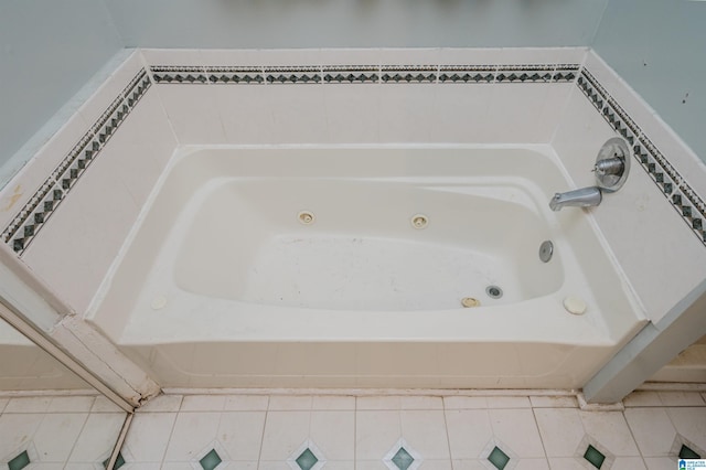 full bathroom with a whirlpool tub