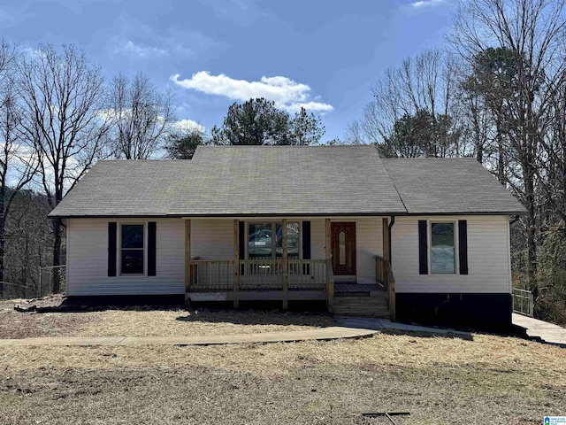 single story home featuring covered porch