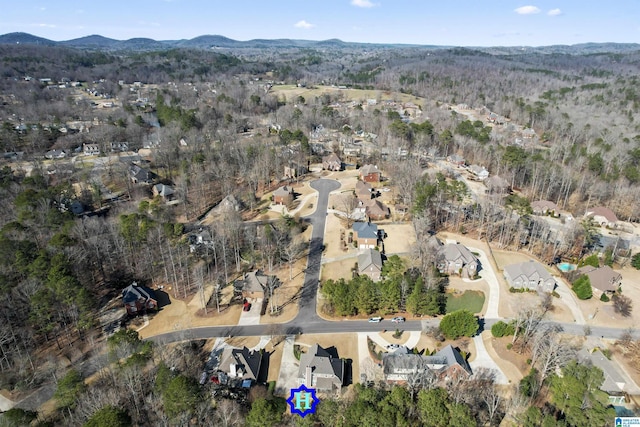 birds eye view of property with a residential view and a mountain view