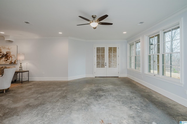 interior space with french doors, recessed lighting, ornamental molding, concrete floors, and baseboards