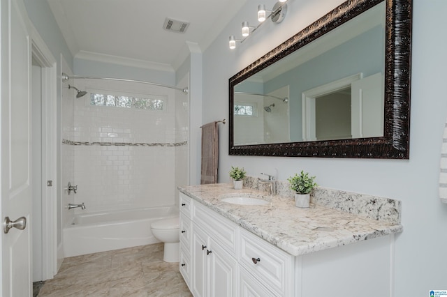 bathroom with visible vents, toilet, crown molding, vanity, and washtub / shower combination