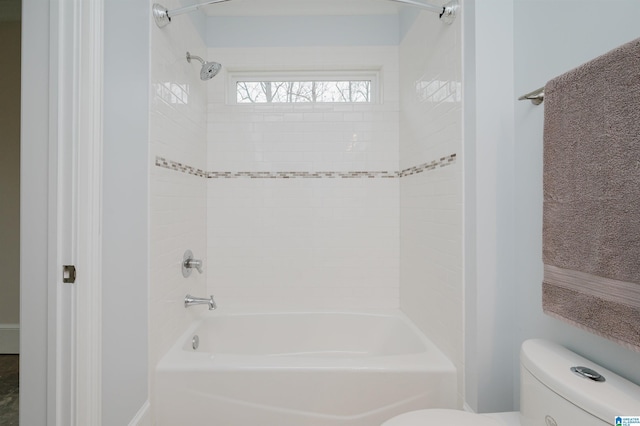 full bath featuring shower / bathtub combination and toilet