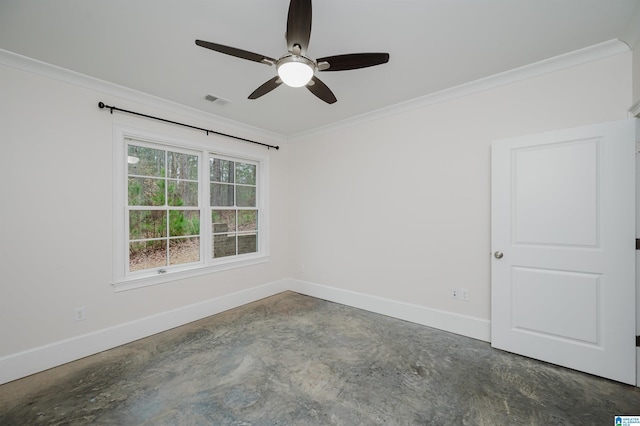 spare room with ornamental molding, visible vents, baseboards, and unfinished concrete floors