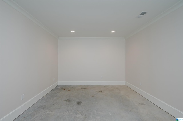 empty room with recessed lighting, visible vents, concrete floors, and baseboards