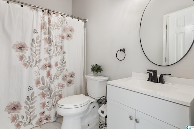 full bathroom with toilet, tile patterned flooring, and vanity