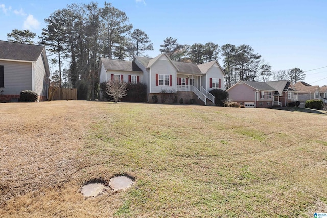 view of front of home featuring a front yard