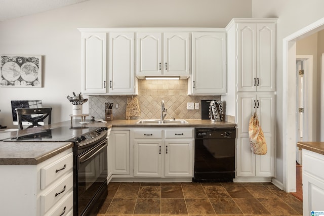 kitchen with tasteful backsplash, white cabinets, dark countertops, black appliances, and a sink