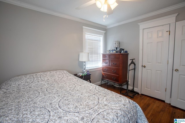 bedroom with ornamental molding, dark wood-style flooring, ceiling fan, and baseboards