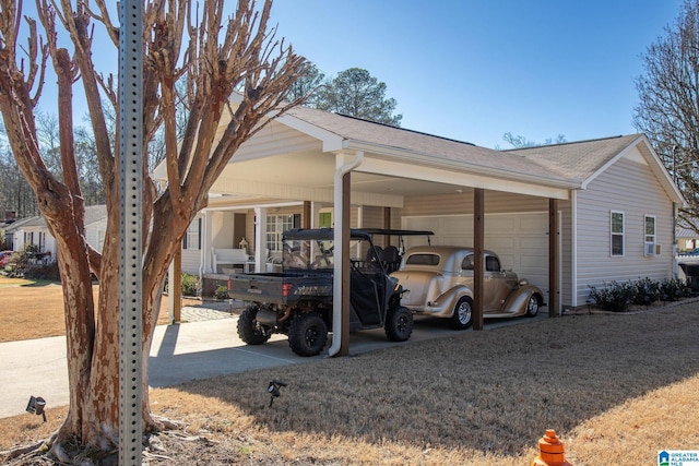 exterior space featuring driveway and a carport