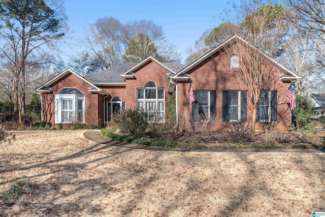 view of front of house featuring brick siding