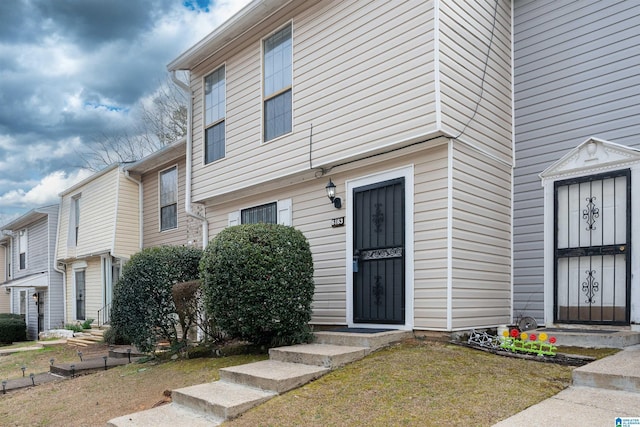 exterior space featuring a front lawn