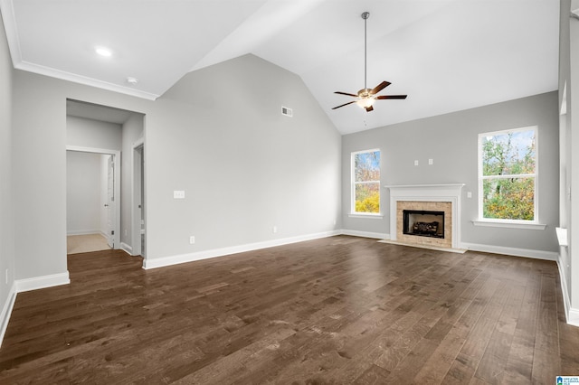 unfurnished living room with visible vents, baseboards, a ceiling fan, a fireplace with flush hearth, and dark wood-type flooring