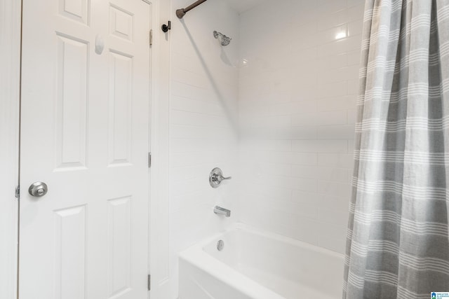 full bathroom with shower / bath combo