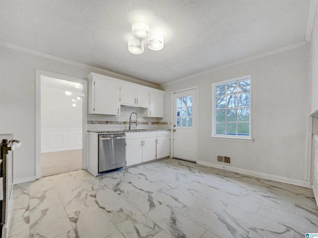 kitchen featuring visible vents, white cabinets, marble finish floor, stainless steel dishwasher, and a sink