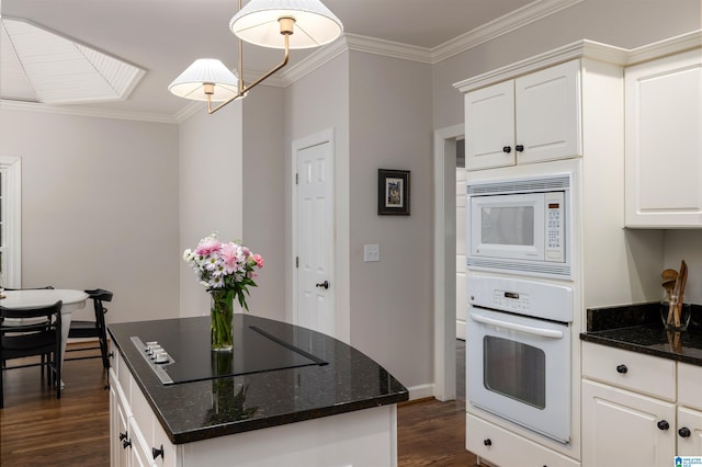 kitchen with dark wood-style floors, pendant lighting, ornamental molding, white cabinetry, and white appliances