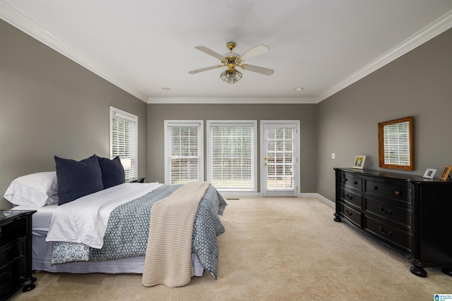 bedroom featuring light carpet, crown molding, baseboards, and ceiling fan