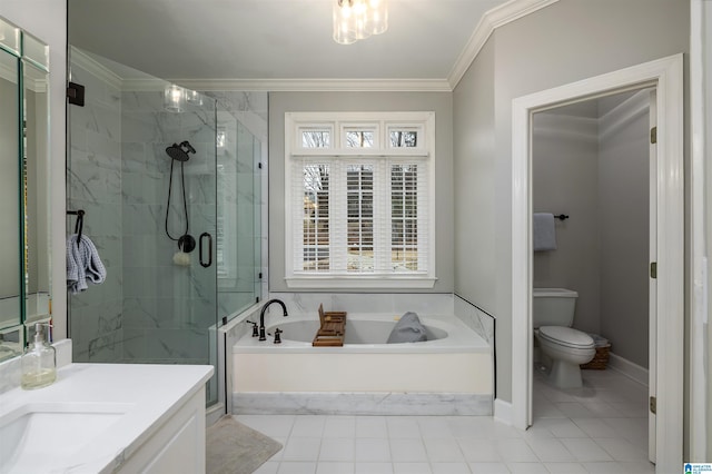 bathroom with toilet, ornamental molding, a shower stall, vanity, and a bath