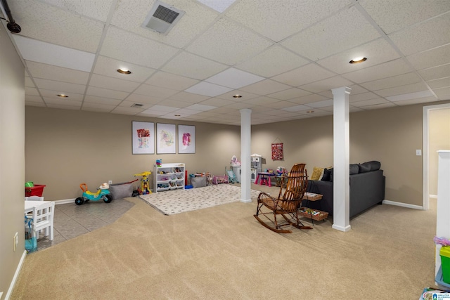 playroom with light colored carpet, visible vents, a paneled ceiling, and baseboards