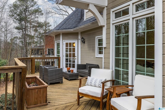 wooden deck with outdoor lounge area