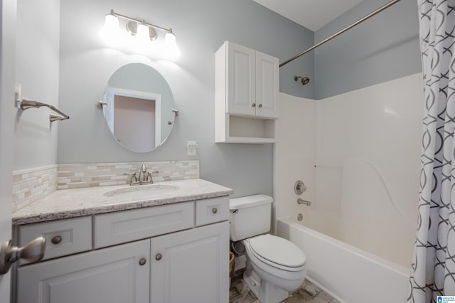 bathroom with toilet, tasteful backsplash, shower / bath combination with curtain, and vanity