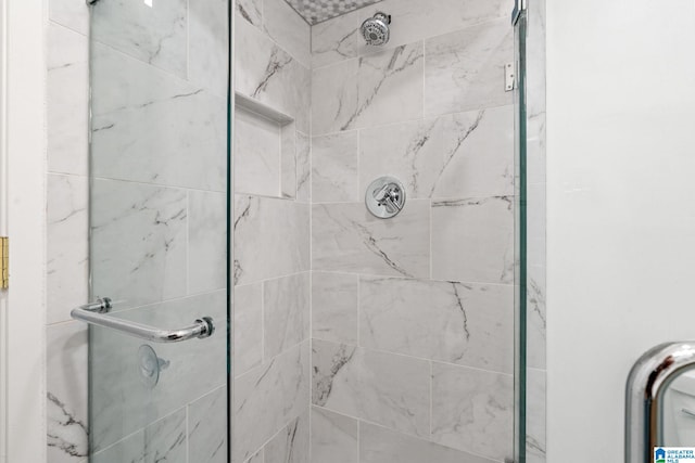 full bathroom featuring a shower stall