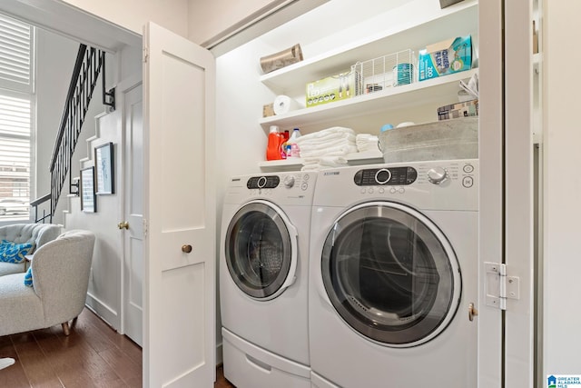 laundry area with laundry area, dark wood-style flooring, and separate washer and dryer