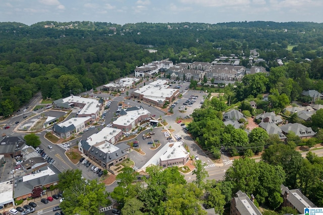 drone / aerial view with a view of trees