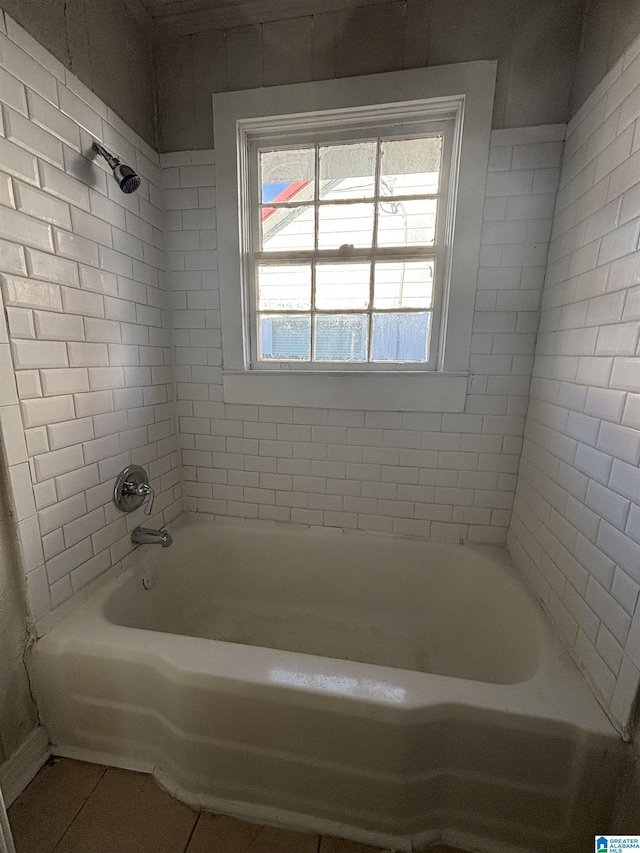 full bath with bathtub / shower combination and tile patterned floors