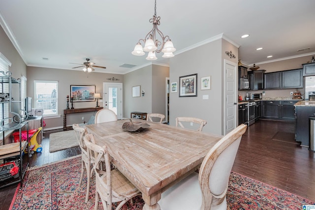 dining area featuring baseboards, dark wood-type flooring, and recessed lighting