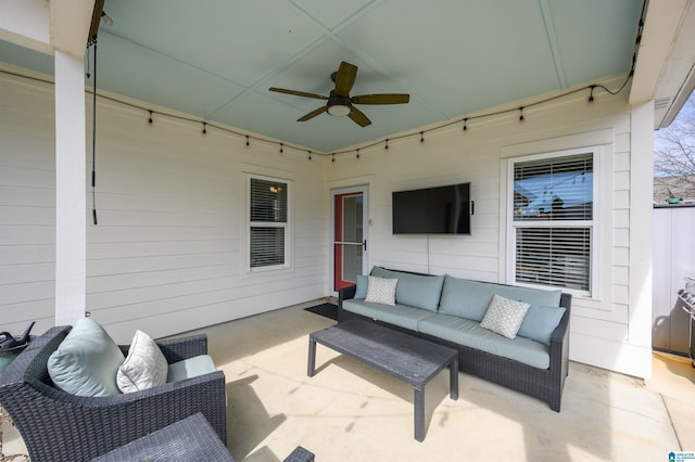 view of patio with ceiling fan and outdoor lounge area