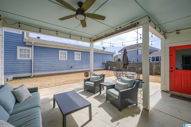 view of patio / terrace featuring a ceiling fan, outdoor dining space, fence, and an outdoor living space