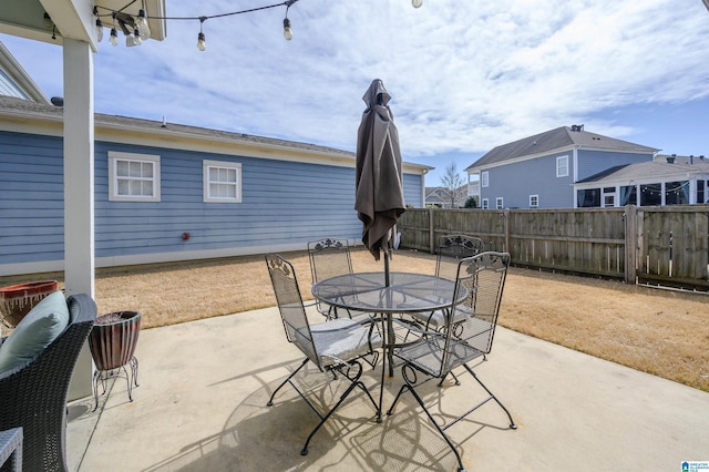 view of patio / terrace with fence and outdoor dining space