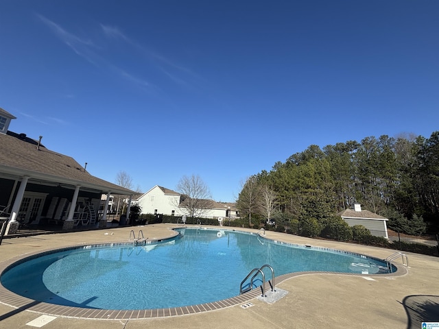 pool with a patio