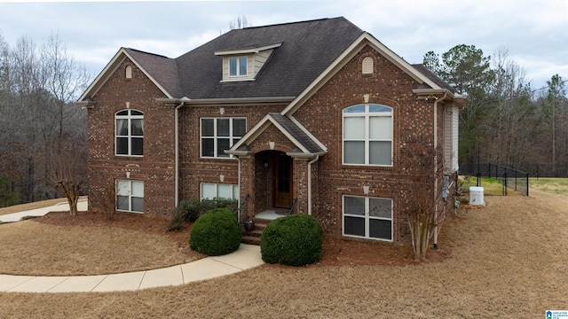 view of front of property featuring brick siding