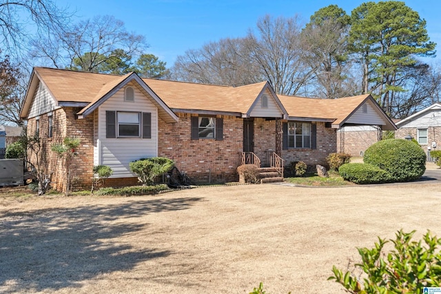 ranch-style house with brick siding