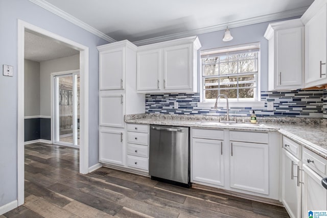 kitchen featuring crown molding, dark wood-type flooring, white cabinets, a sink, and dishwasher