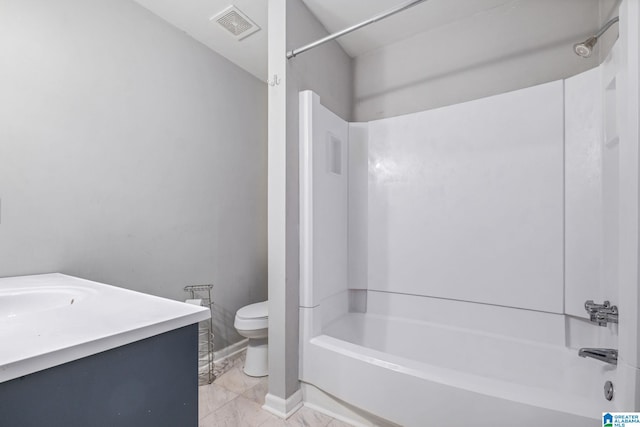 bathroom featuring marble finish floor, visible vents, toilet, vanity, and  shower combination